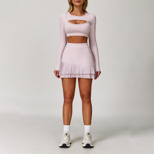 Top sportif à manches longues + golf et jupes de tennis