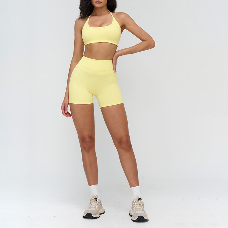 Halter-neck open-back sports bra + high-waisted shorts 2-piece set
