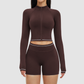 Wholesale color-blocked stand-collar zippered jacket + high-waisted tight shorts