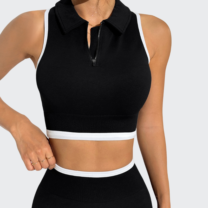A seamless round neck sleeveless zip bra and sports pants two-piece set