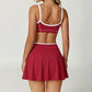 Wholesale sports color-blocked bra + A-line skirt 2-piece set