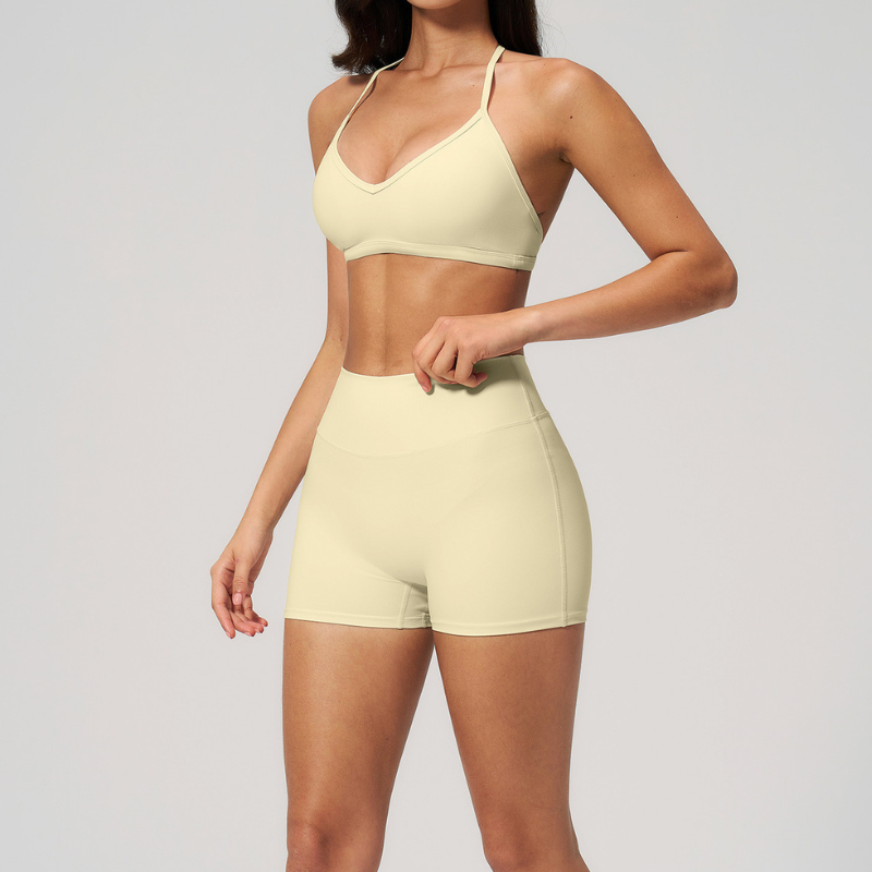 Wholesale Women's Halter Neck Sports Bra & High-Waist Booty Shorts Set – Seam-Detail Quick-Dry 2-Piece Yoga Set