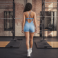 Wholesale Women's Cross-Back Yoga Bodysuit – Brushed Slim Fit Athletic Shorts Jumpsuit w/ Chest Pad
