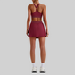 Wholesale Naked-Feel Sports Bra & Pleated Tennis Skirt Set – Quick-Dry Athletic 2-Piece with Built-In Shorts