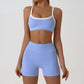 Wholesale color-blocked sports bra + high-elasticity shorts