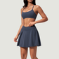 Wholesale Cross Straps Naked-Feel Sports Bra & Pleated Tennis Skirt Set