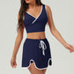 V-neck Sports Crop Top + Color-Blocked Skirt 2-Piece Set