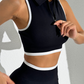 A seamless round neck sleeveless zip bra and sports pants two-piece set