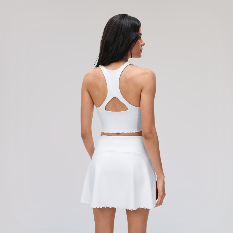 Wholesale round neck tank top + fake two piece tennis skirt