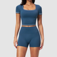 Wholesale Women's Seam-Detail Short Sleeve Crop Top + High-Waist Shorts Set – Butt-Lifting Yoga Gym Activeweare