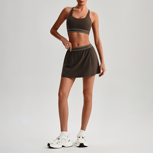 Wholesale Naked-Feel Sports Bra & Pleated Tennis Skirt Set – Quick-Dry Athletic 2-Piece with Built-In Shorts