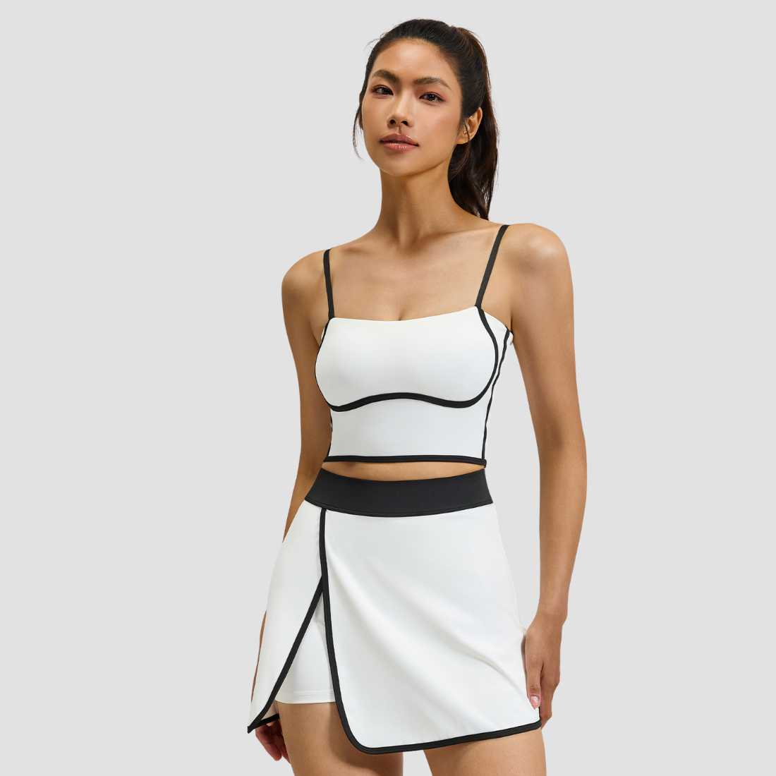 Wholesale Women's Linear Design Sports Bra & Mini Skirt Yoga Set w/ Chest Pad