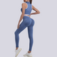 A seamless round neck sleeveless zip bra and sports pants two-piece set