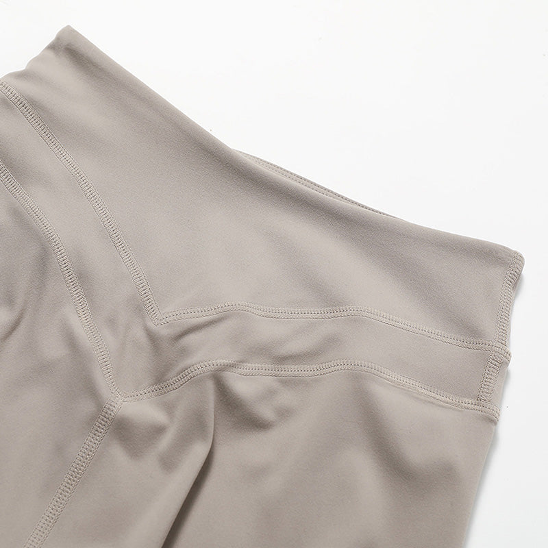 Halter-neck open-back sports bra + high-waisted shorts 2-piece set