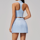 Wholesale Women's Polo Collar Tennis Set – Fixed Cup Sports Bra & Anti-Exposure Pleated Skirt