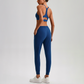 Wholesale Naked-Feel Open-Back Sports Bra & High-Waist Jogger Pants Set – Sculpting Yoga 2-Piece