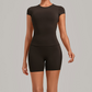 Wholesale Women's Open-Back Pleated Yoga Set Short Sleeve Crop Top & Shorts with Chest Pad