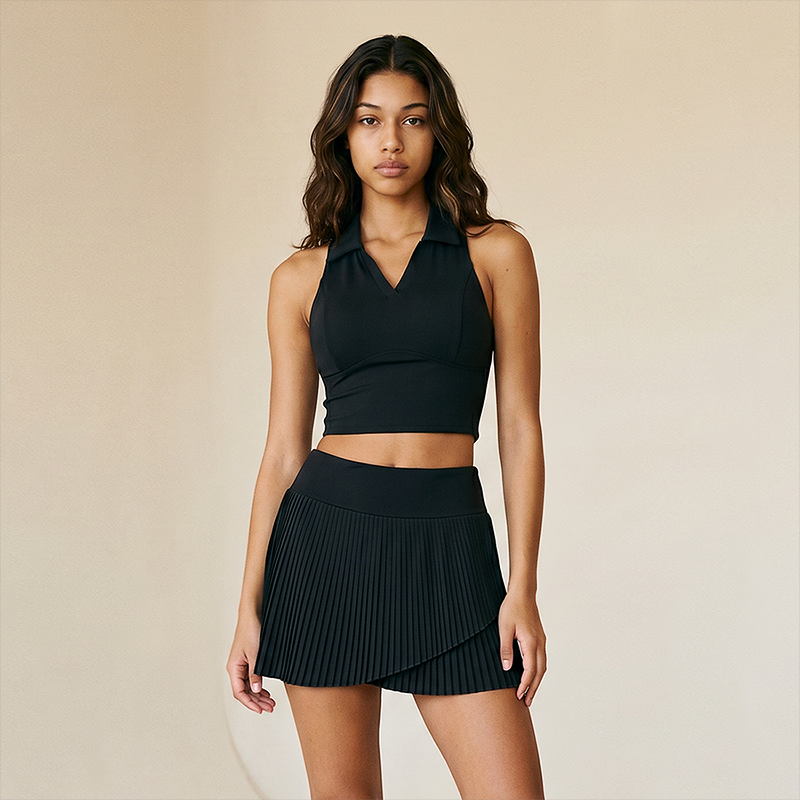 Wholesale Women's Polo Collar Fixed Cup Sports Bra & Anti-Exposure Pleated Skirt Tennis Set