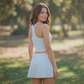 Wholesale Sleeveless Sports Top & Pleated Tennis Skirt Set – Quick-Dry Athletic 2-Piece with Built-In Shorts