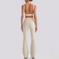 Wholesale Women's Open-Back Long Sleeve Crop Top & High Waist Leggings Set with Chest Pad