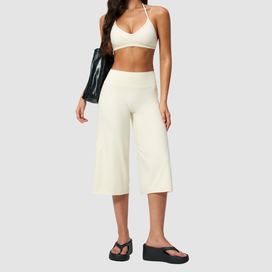 Wholesale Women's Brushed Sports Bra & Wide-Leg Cropped Pants Set – High-Support Seam-Detail 2-Piece Yoga Set