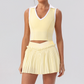 Wholesale Women's Halter Neck Sports Bra & Pleated Mini Skirt Set with Chest Pad