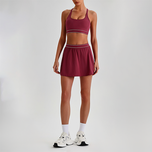 Wholesale Naked-Feel Sports Bra & Pleated Tennis Skirt Set – Quick-Dry Athletic 2-Piece with Built-In Shorts