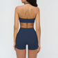 Halter-neck open-back sports bra + high-waisted shorts 2-piece set