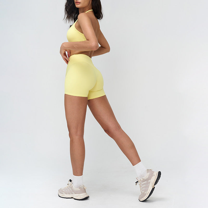 Halter-neck open-back sports bra + high-waisted shorts 2-piece set