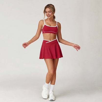 Wholesale sports color-blocked bra + A-line skirt 2-piece set