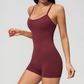 Wholesale Women's Cross-Back Yoga Bodysuit – Brushed Slim Fit Athletic Shorts Jumpsuit w/ Chest Pad