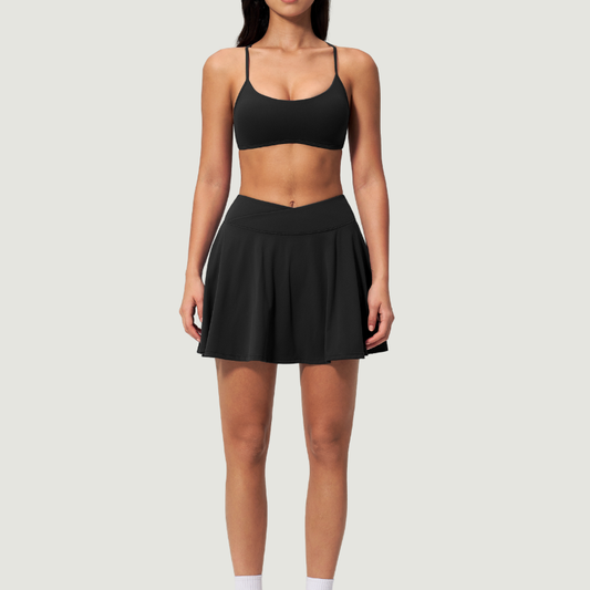 Wholesale Cross Straps Naked-Feel Sports Bra & Pleated Tennis Skirt Set