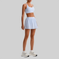 Wholesale Naked-Feel Sports Bra & Pleated Tennis Skirt Set – Quick-Dry Athletic 2-Piece with Built-In Shorts