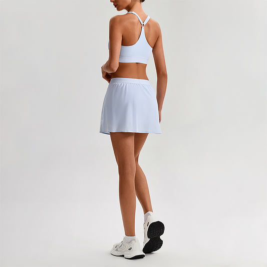Wholesale Naked-Feel Sports Bra & Pleated Tennis Skirt Set – Quick-Dry Athletic 2-Piece with Built-In Shorts