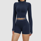 Wholesale color-blocked stand-collar zippered jacket + high-waisted tight shorts