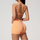 Wholesale Women's Halter Neck Sports Bra & High-Waist Booty Shorts Set – Seam-Detail Quick-Dry 2-Piece Yoga Set
