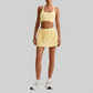 Wholesale Naked-Feel Sports Bra & Pleated Tennis Skirt Set – Quick-Dry Athletic 2-Piece with Built-In Shorts