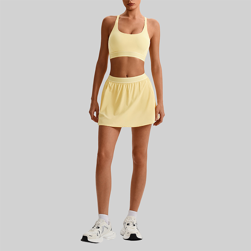 Wholesale Naked-Feel Sports Bra & Pleated Tennis Skirt Set – Quick-Dry Athletic 2-Piece with Built-In Shorts