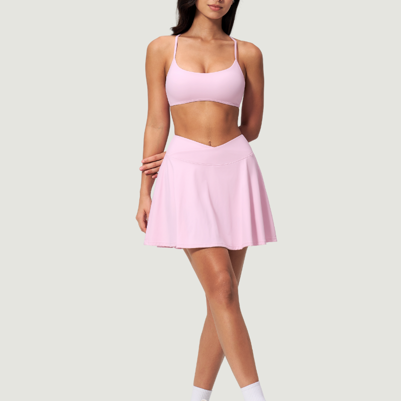 Wholesale Cross Straps Naked-Feel Sports Bra & Pleated Tennis Skirt Set