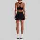 Wholesale Naked-Feel Sports Bra & Pleated Tennis Skirt Set – Quick-Dry Athletic 2-Piece with Built-In Shorts