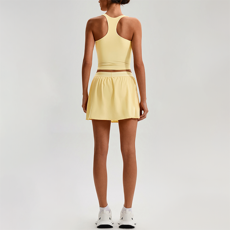 Wholesale Sleeveless Sports Top & Pleated Tennis Skirt Set – Quick-Dry Athletic 2-Piece with Built-In Shorts