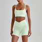 Wholesale Brushed Naked-Feel Open-Back Sports Bra & High-Waist Shorts Set – Sculpting Yoga 2-Piece