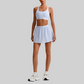 Wholesale Naked-Feel Sports Bra & Pleated Tennis Skirt Set – Quick-Dry Athletic 2-Piece with Built-In Shorts