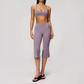 Wholesale Women's High-Impact Sports Bra & Capri Pants Yoga Set with Chest Pad
