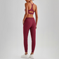 Wholesale Naked-Feel Open-Back Sports Bra & High-Waist Jogger Pants Set – Sculpting Yoga 2-Piece