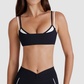 Faux two-piece color-blocked sports bra