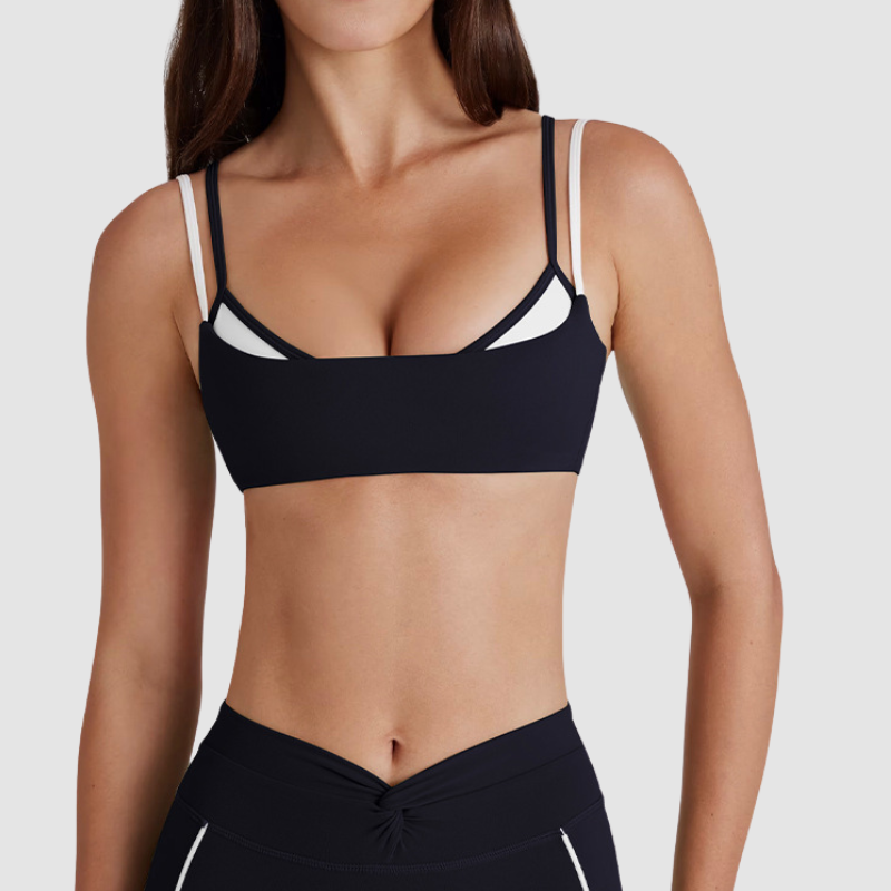 Faux two-piece color-blocked sports bra