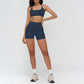 Halter-neck open-back sports bra + high-waisted shorts 2-piece set