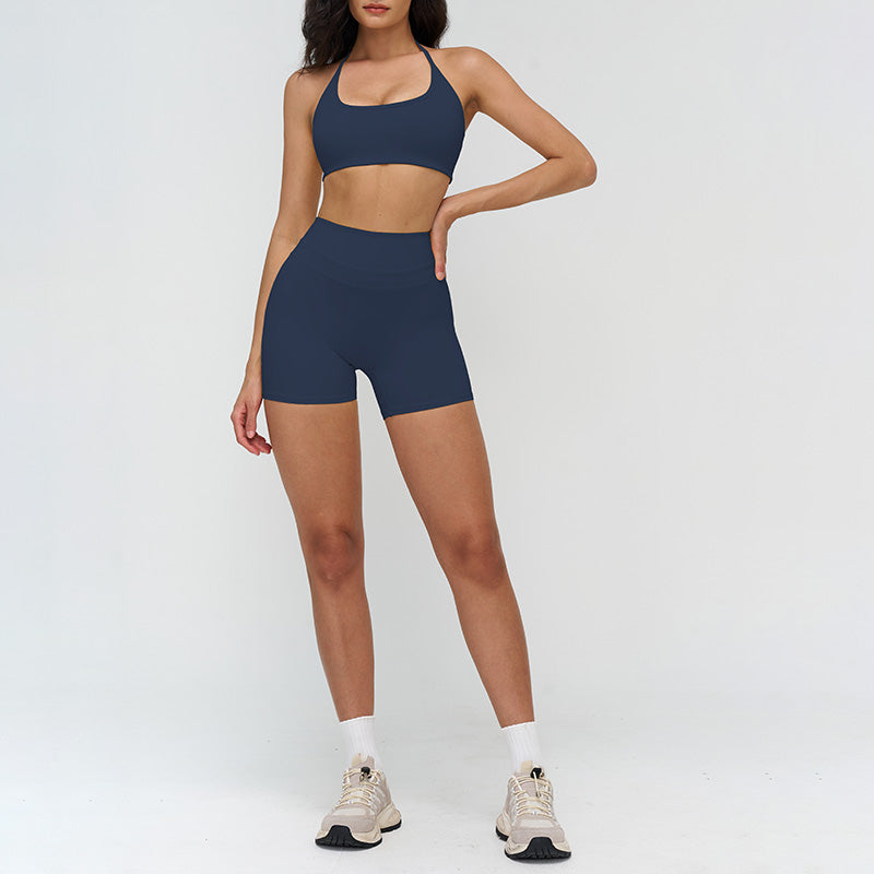 Halter-neck open-back sports bra + high-waisted shorts 2-piece set