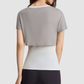 Wholesale Women's Color-Block Faux Two-Piece Yoga Short-Sleeve Top
